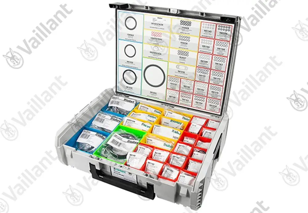 Vorratsbox von Vaillant mit verschiedenen Dichtungen und O-Ringen, organisiert in mehreren bunten Fächern, zur Verwendung bei Wartungen und Reparaturen.